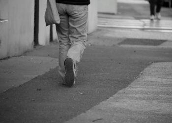 person walking with fitness tracker